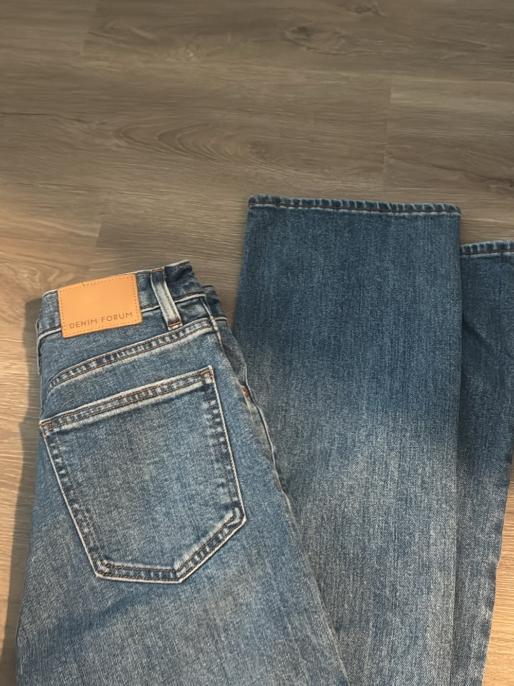 Denim Forum Women's Boot Cut Jeans in Medium Blue with Tan Patch